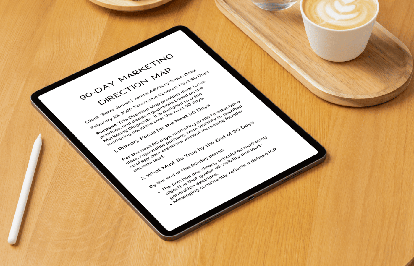 90-Day Marketing Direction Map displayed on a tablet on a wooden desk.